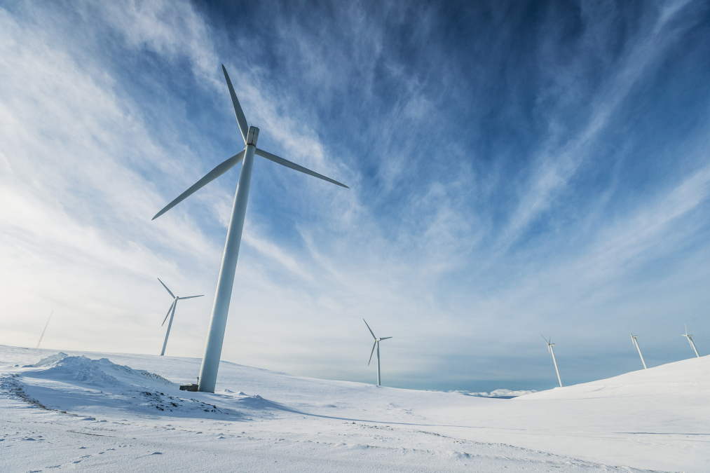 A picture of a wind power sustainable resource farm in the Arctic.